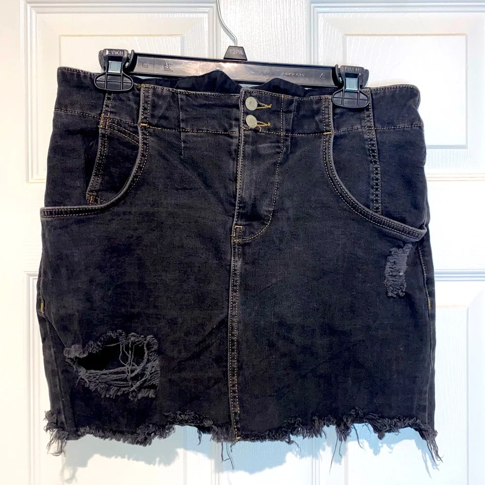 Free People distressed denim black mini skirt. Size 8